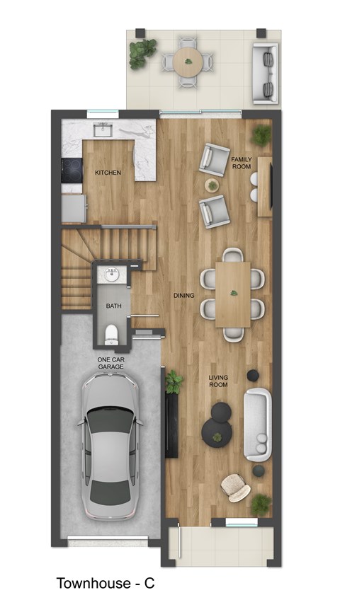 A floor plan of a townhouse with a kitchen, dining room, living room, and garage.